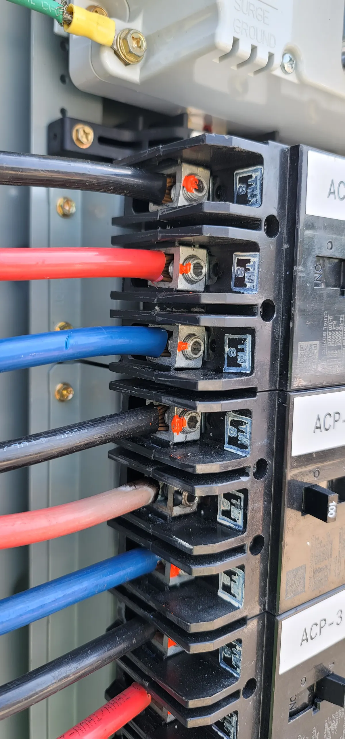 Solar disconnect breaker connections inspected with torque marks for preventive maintenance